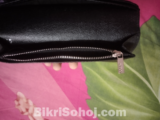 wallet kisu din bebohar kora hoise new ar motoy ase